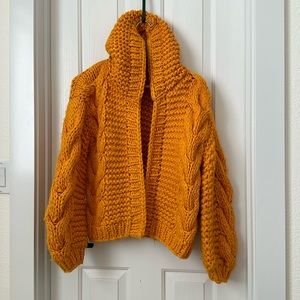 Beautiful chunky knit tangerine sweater!